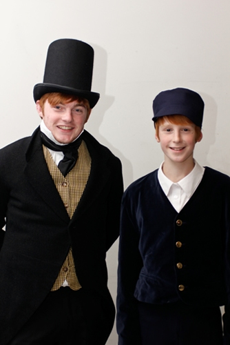Herbert (Adrian Snow) and his young alter ego (Jacob Grantham)