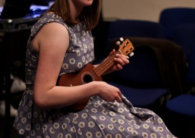 Emily Ashberry providing interval entertainment with her ukulele